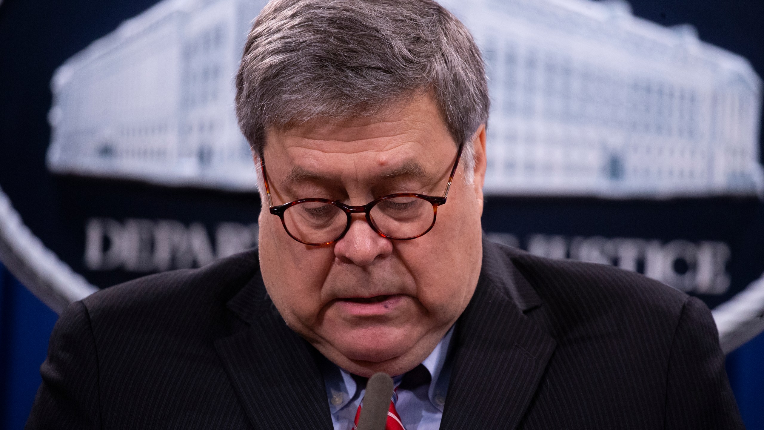 Attorney General William Barr speaks during a news conference, Monday, Dec. 21, 2020 at the Justice Department in Washington. (Michael Reynolds/Pool via AP)