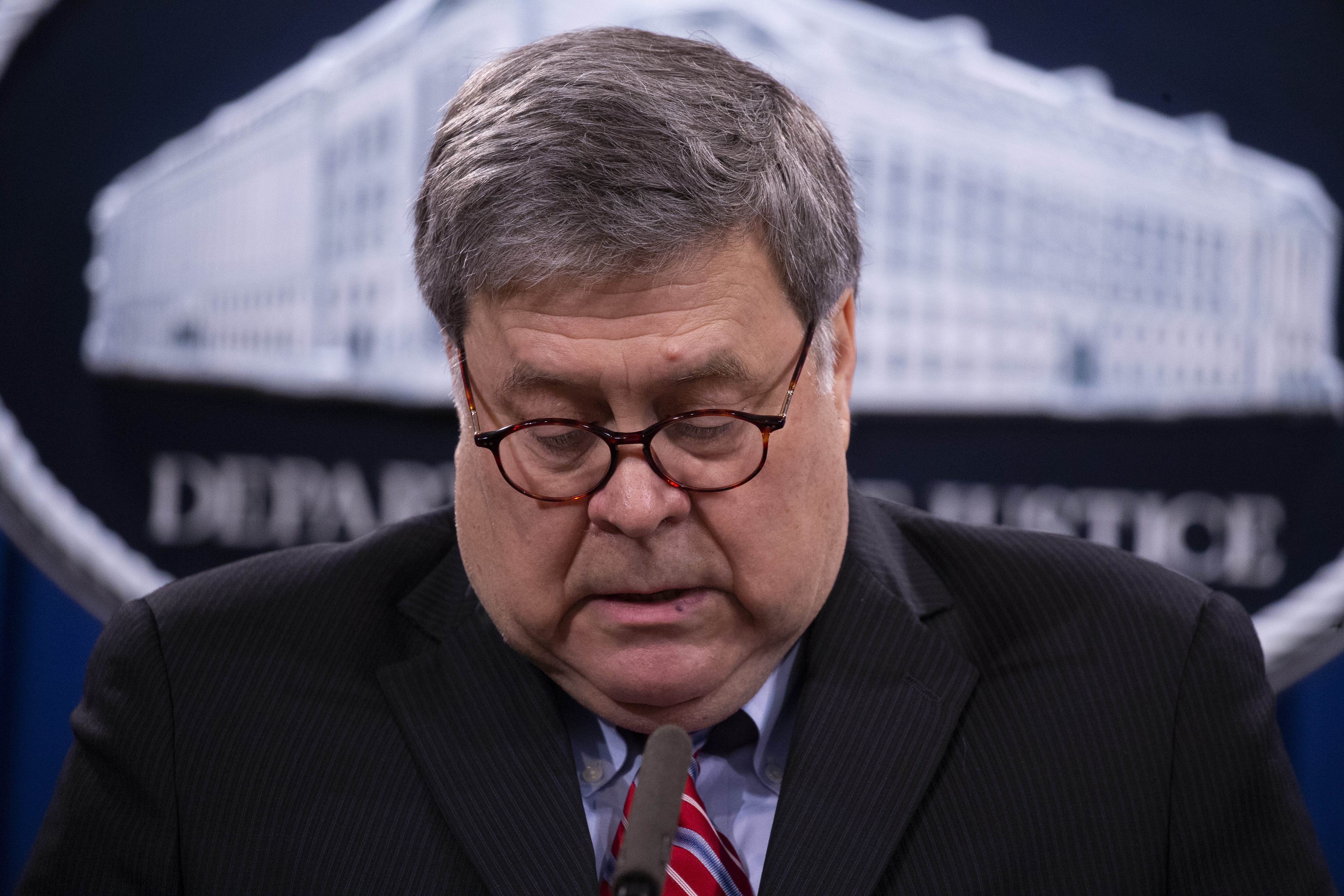 Attorney General William Barr speaks during a news conference, Monday, Dec. 21, 2020 at the Justice Department in Washington. (Michael Reynolds/Pool via AP)