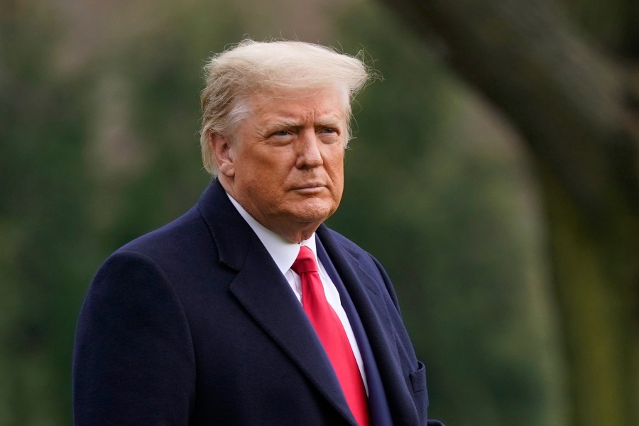 In this Dec. 12, 2020, file photo President Donald Trump walks on the South Lawn of the White House in Washington before boarding Marine One. (Patrick Semansky/AP Photo)