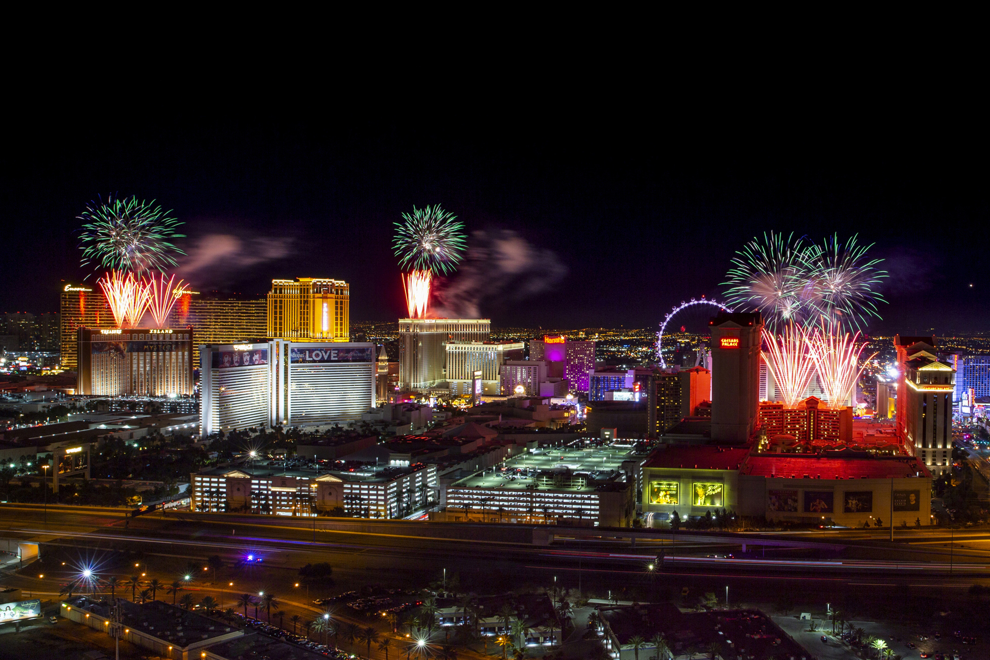 In this Jan. 1, 2020 file photo, fireworks for New Year's Eve erupt over the Las Vegas Strip. The 2021 fireworks show was canceled, but revelers still lined the strip despite concerns over the coronavirus. (L.E. Baskow/Las Vegas Review-Journal via Associated Press)