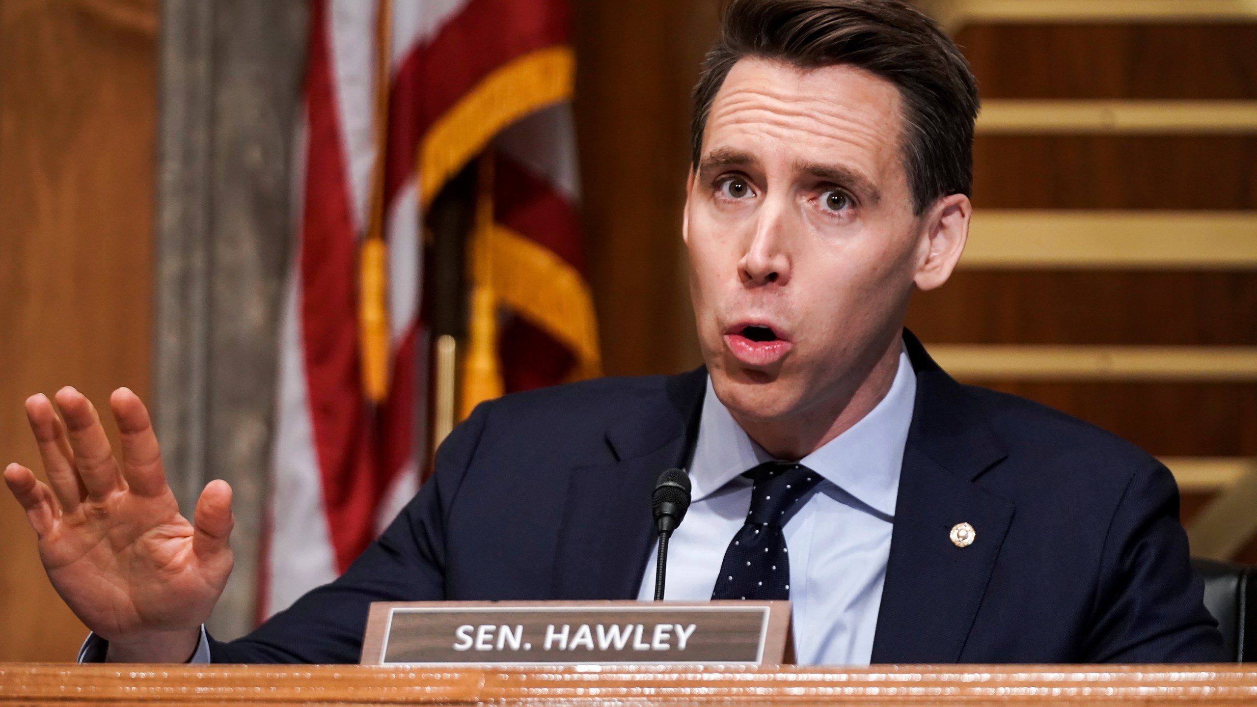 In this Dec. 16, 2020 file photo, Sen. Josh Hawley, R-Mo., asks questions during a Senate Homeland Security & Governmental Affairs Committee hearing to discuss election security and the 2020 election process on Capitol Hill in Washington. Walmart apologized on Wednesday, Dec. 30, for a tweet that called Hawley a sore loser for contesting the U.S. presidential election. The tweet from Walmart was in response to Hawley’s tweet announcing his plans to raise objections next week when Congress meets to affirm President-elect Joe Biden’s victory in the election. (Greg Nash/Pool via AP, File)