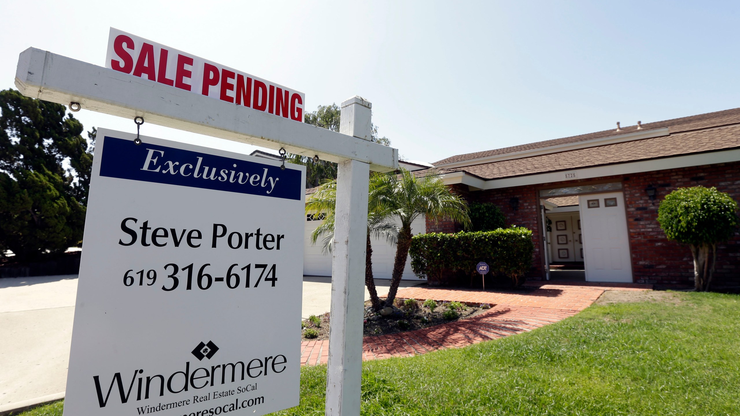 In this Wednesday, Aug. 14, 2013, file photo, a home is for sale in San Diego. (AP Photo/Gregory Bull, File)