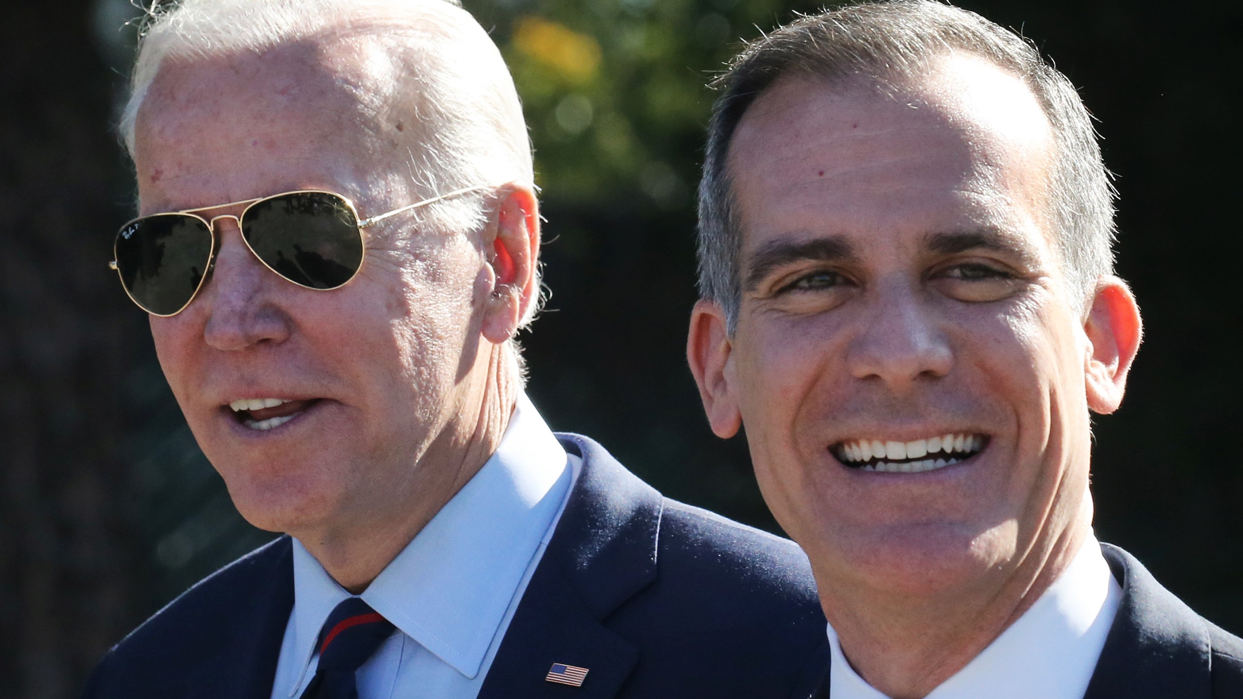 Then-Democratic presidential candidate and former U.S. Vice President Joe Biden (L) walks with Los Angeles Mayor Eric Garcetti at a campaign event at United Firefighters of Los Angeles City on Jan. 10, 2020. (Mario Tama/Getty Images)