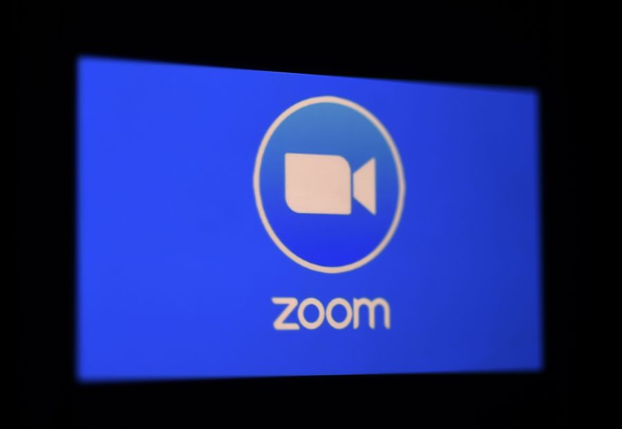 In this photo illustration a Zoom App logo is displayed on a smartphone on March 30, 2020, in Arlington, Virginia. (Olivier Douliery / AFP / Getty Images)