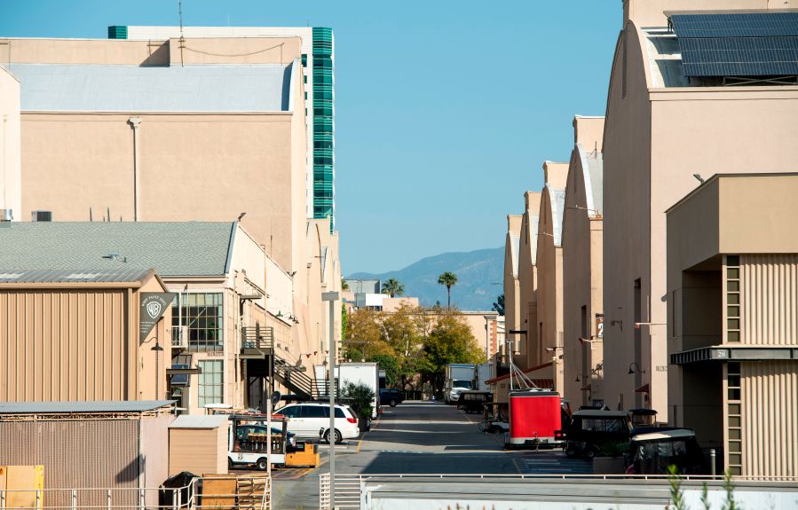 View of an empty street between sets in the Warner Bros lot during the pandemic on April 2, 2020 in North Hollywood. (VALERIE MACON/AFP via Getty Images)