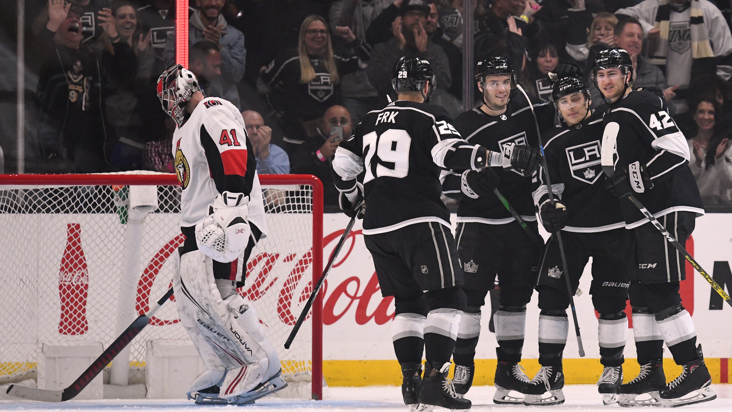 Gabriel Vilardi #42 of the Los Angeles Kings celebrates his goal with Trevor Moore #12, Matt Roy #3 and Martin Frk #29 against Ottawa Senators at Staples Center on March 11, 2020. (Harry How/Getty Images)