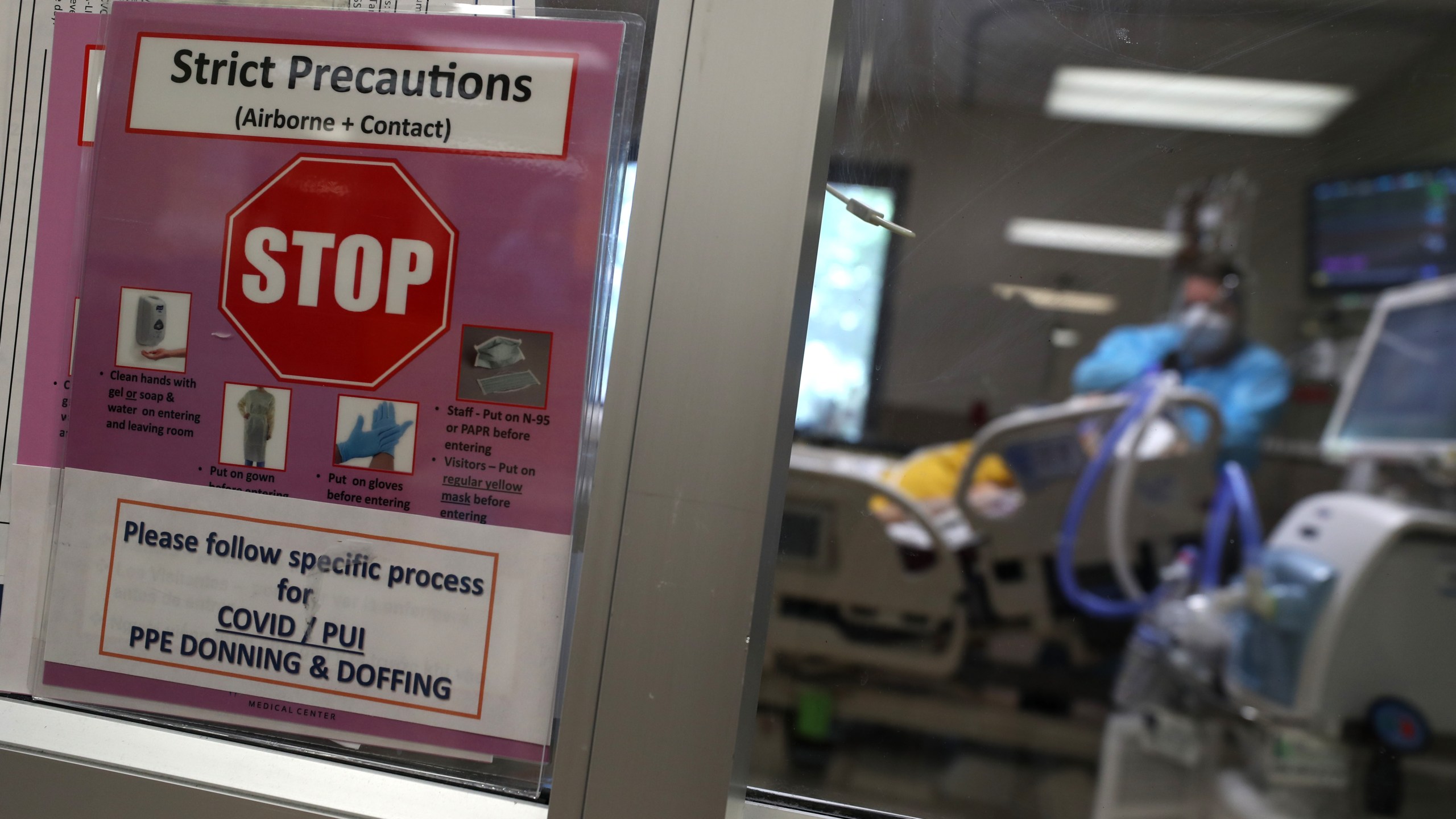 A sign is posted in the window of a coronavirus COVID-19 patient's room in the intensive care unit at Regional Medical Center on May 21, 2020, in Santa Clara County. (Justin Sullivan/Getty Images)