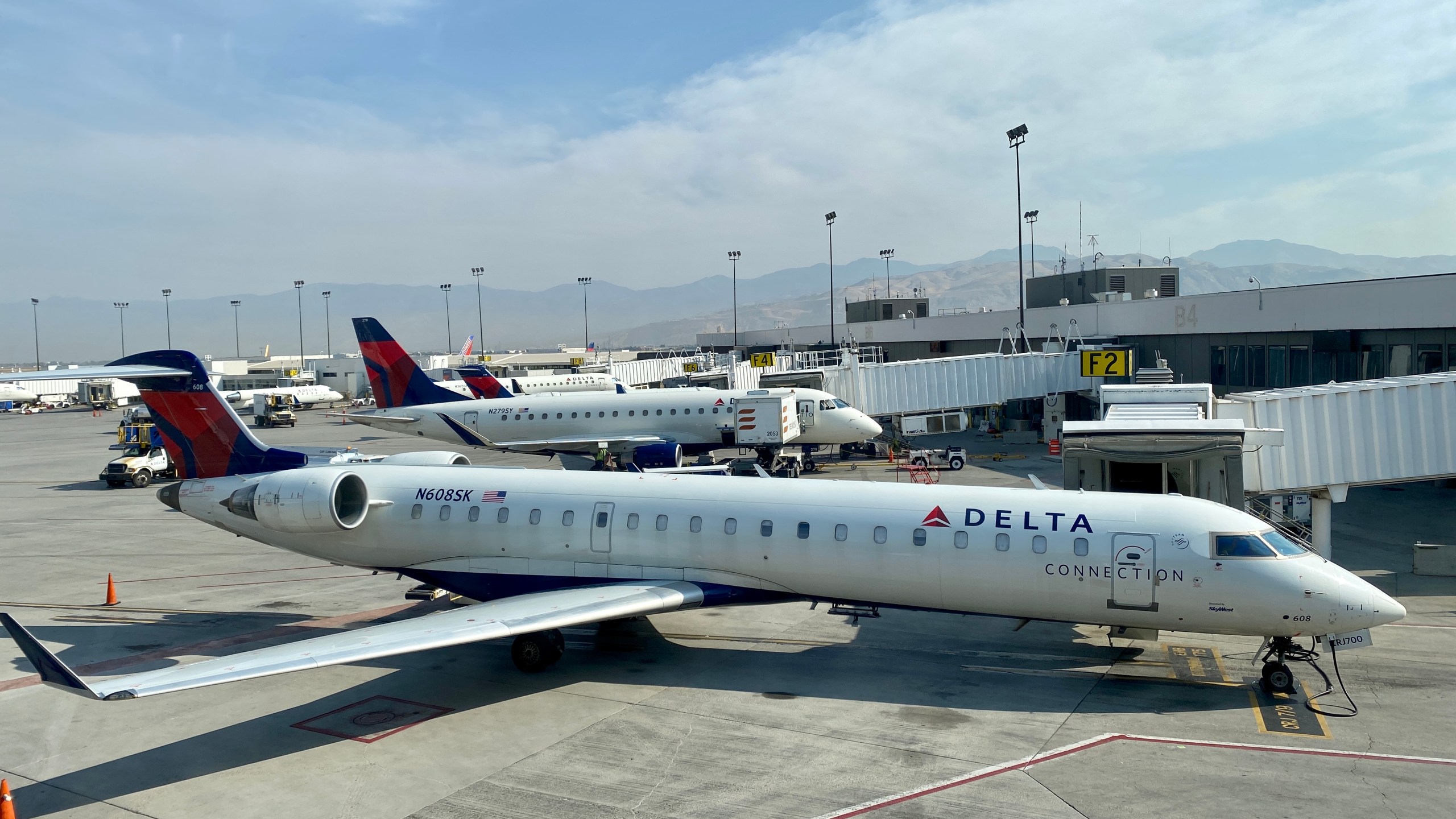 In this file photo, a Delta plane is seen at the gate at Salt Lake City International Airport in Utah on Oct. 5, 2020. (DANIEL SLIM/AFP via Getty Images)