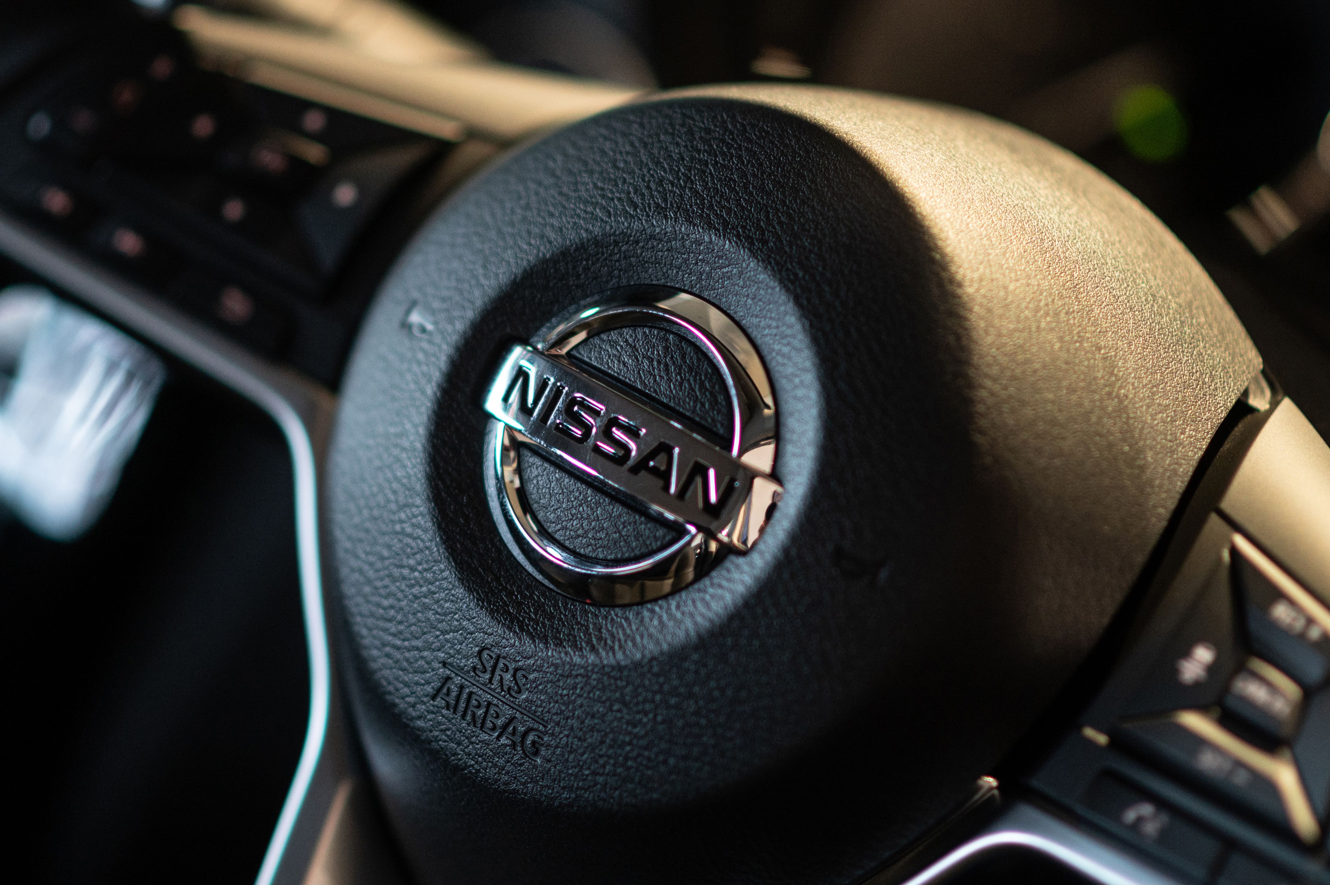 The Nissan logo is seen on a car at the showroom at the company's global headquarters in Yokohama, Kanagawa prefecture on November 12, 2020. (Philip Fong/AFP via Getty Images)