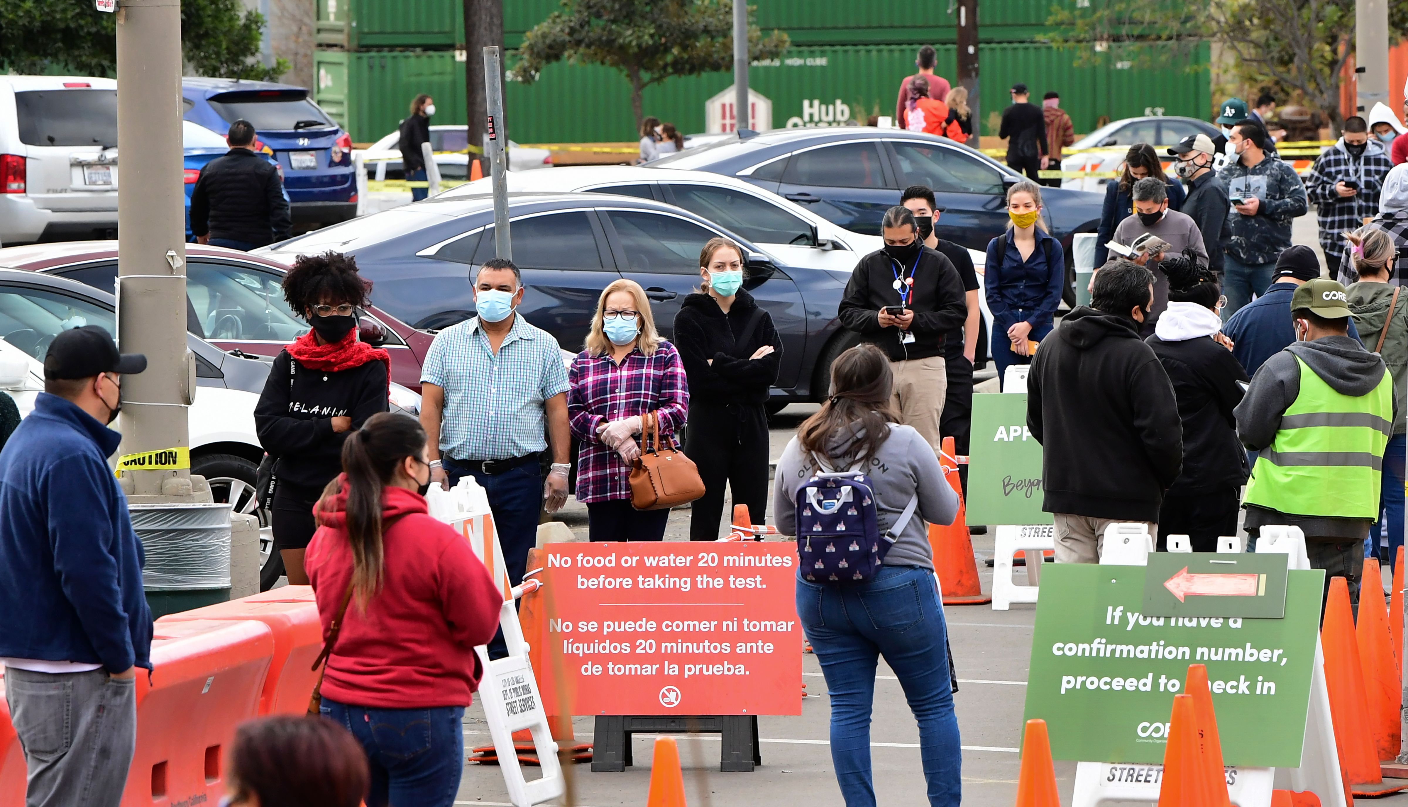 People wait in line at a Covid-19 testing center despite the Stay-At-Home regulation underway in Los Angeles, California on December 8, 2020. (Frederic J. Brown/AFP via Getty Images)