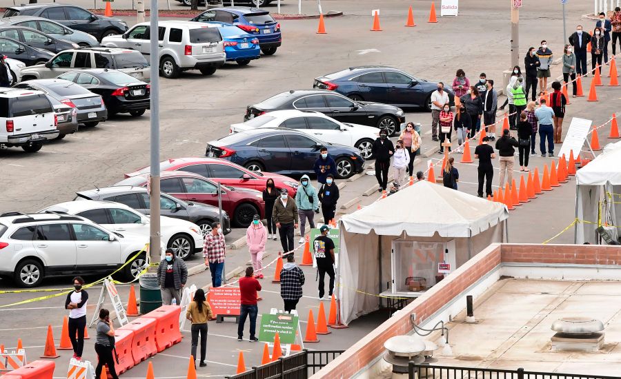 People wait in line at a coronavirus testing center in Los Angeles on Dec. 8, 2020. (FREDERIC J. BROWN/AFP via Getty Images)