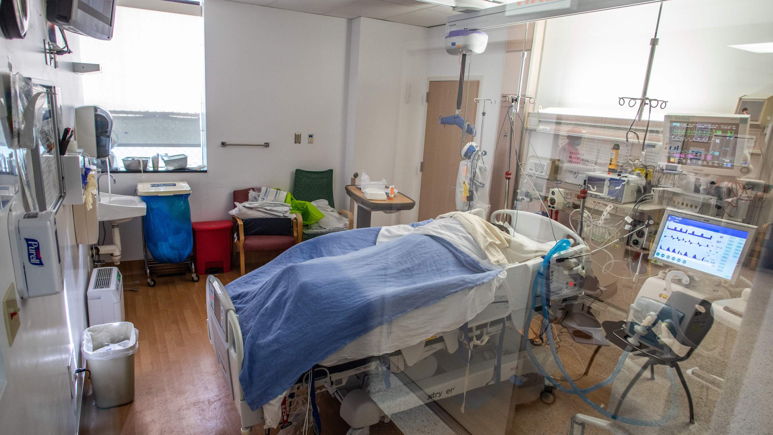 A Covid-19 patient lies on a bed in an Intensive Care Unit (ICU) at Providence Cedars-Sinai Tarzana Medical Center in Tarzana, California on December 18, 2020. (Apu Gomes/AFP via Getty Images)