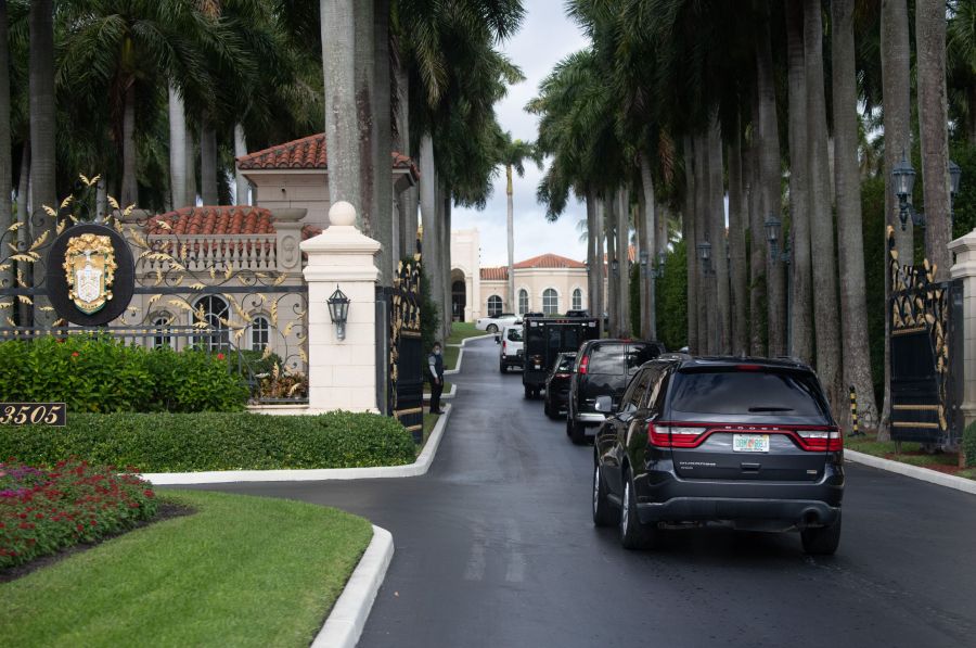 The motorcade of President Donald Trump arrives at Trump International Golf Club in West Palm Beach, Florida, on Dec. 24, 2020. (SAUL LOEB/AFP via Getty Images)