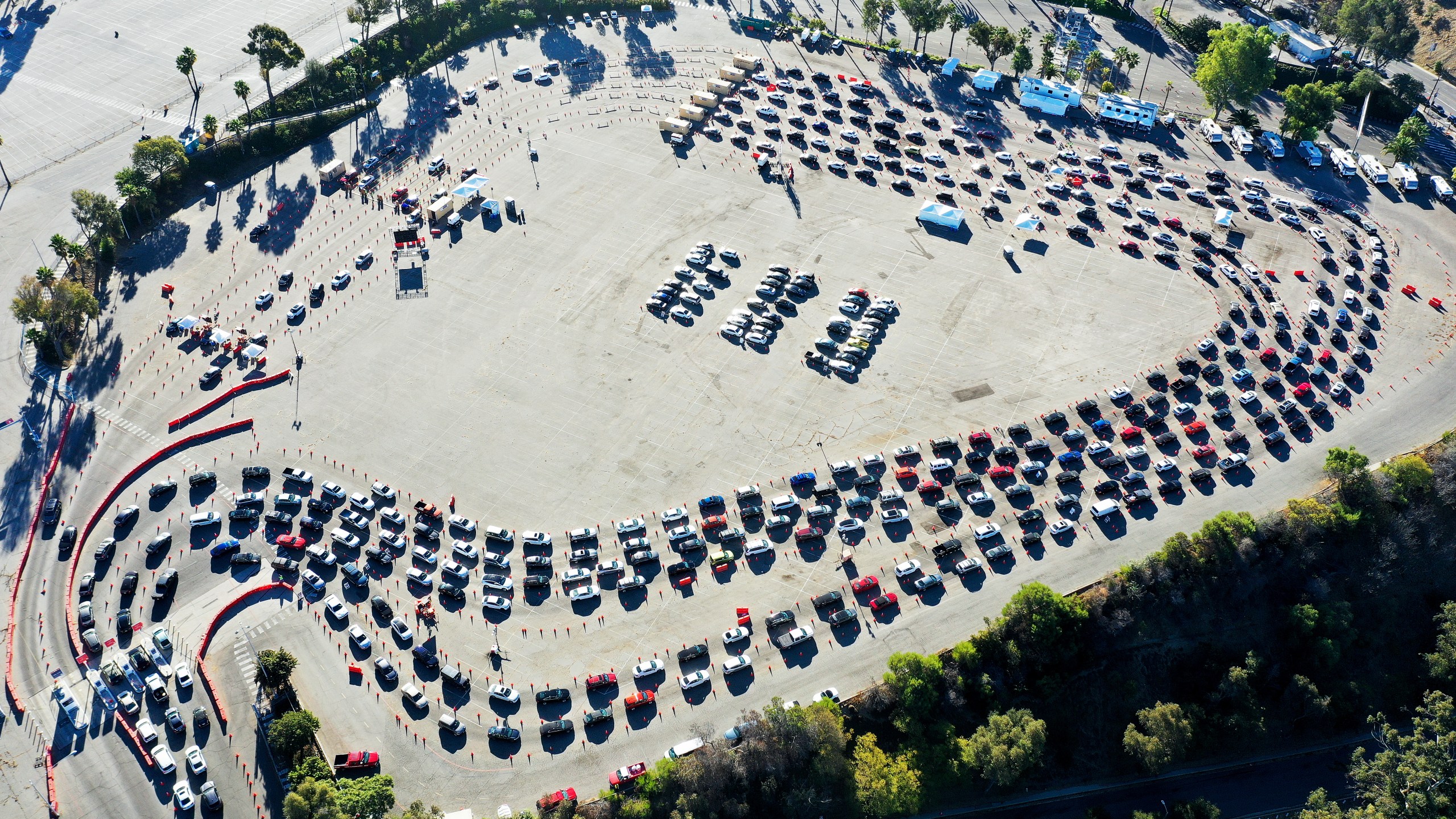 In an aerial view from a drone, cars are lined up at Dodger Stadium for COVID-19 testing on the Monday after Thanksgiving weekend on November 30, 2020 in Los Angeles. (Mario Tama/Getty Images)