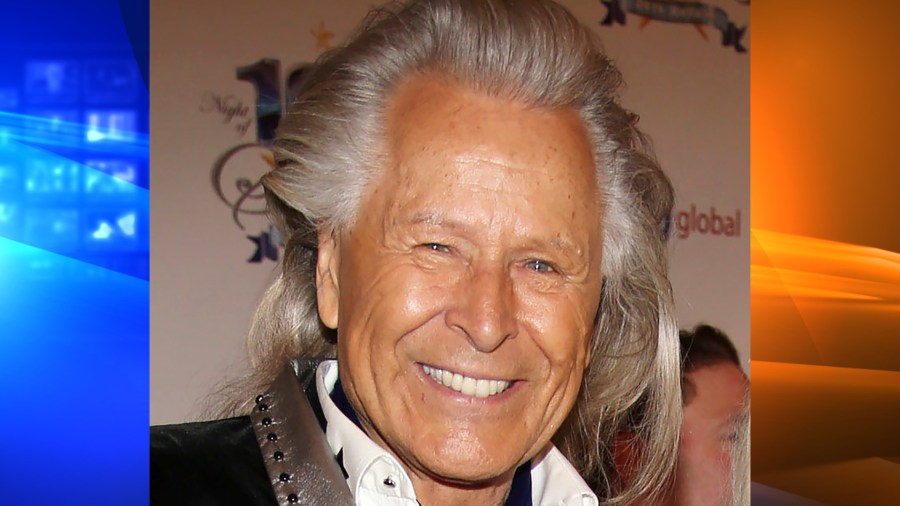 In this March 2, 2014, file photo, Peter Nygard attends the 24th Night of 100 Stars Oscars Viewing Gala at The Beverly Hills Hotel in Beverly Hills, Calif. Nygard faces criminal charges in New York after his Canadian arrest on charges alleging that he dangled opportunities in fashion and modeling to lure dozens of women and girls to have sex with himself and others. The 79-year-old Nygard awaited an appearance in a Winnipeg courtroom after his Monday, Dec. 14, 2020 arrest in Winnipeg, Manitoba, Canada by Canadian authorities at the request of the United States. (Annie I. Bang /Invision/AP, File)