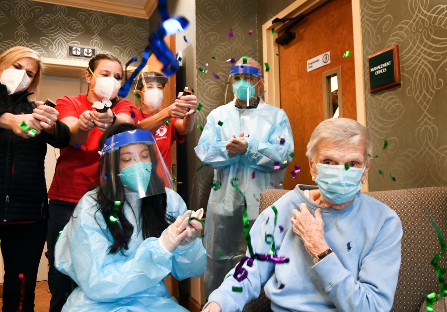 Jeanne Peters, 95, a rehab patient at The Reservoir, a nursing facility, was given the first COVID-19 vaccination in a Ct. nursing home on Dec. 18, 2020, in West Hartford, Conn. (AP Photo/Stephen Dunn,POOL)