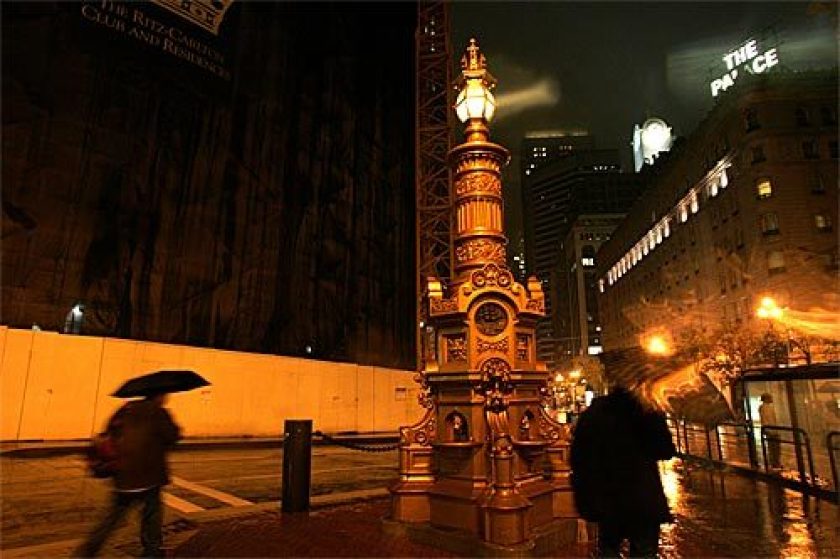 Lotta’s Fountain in downtown San Francisco glows on a rainy, chilly evening.(Genaro Molina / Los Angeles Times)