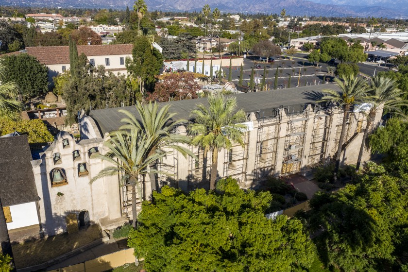 The San Gabriel Mission’s temporary roof, which will protect it during the rainy season as restoration begins after a fire heavily damaged the historic building in July.(Robert Gauthier / Los Angeles Times)