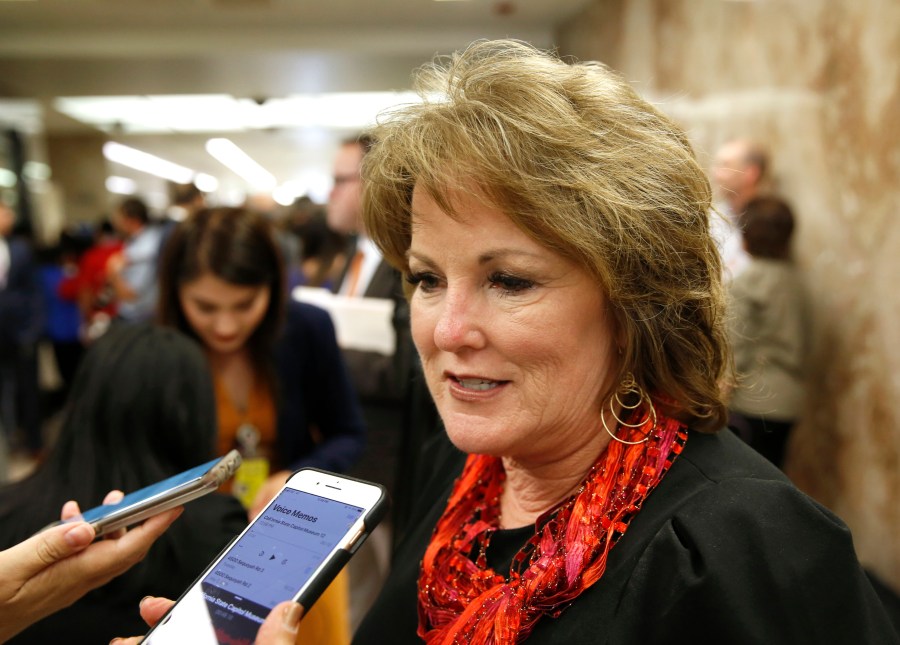 In this May 9, 2019, file photo, State Sen. Republican Leader Shannon Grove, of Bakersfield, talks to reporters about Gov. Gavin Newsom proposed 2019-2020 revised state budget in Sacramento, Calif. (AP Photo/Rich Pedroncelli, File)