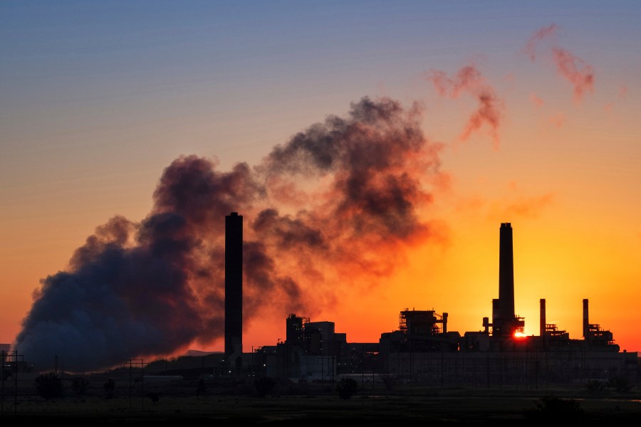 The Dave Johnson coal-fired power plant is silhouetted against the morning sun in Glenrock, Wyo., Friday, July 27, 2018. The Trump administration has weakened an Obama-era rule aimed at stopping coal plant pollution that has contaminated streams, lakes and underground aquifers. The changes finalized Monday, Aug. 31, 2020, will allow utilities to use cheaper wastewater cleanup technologies and take longer to comply with pollution reduction guidelines adopted in 2015. Its the latest in a string of regulatory rollbacks for the coal power industry under Trump. (AP Photo/J. David Ake, File)