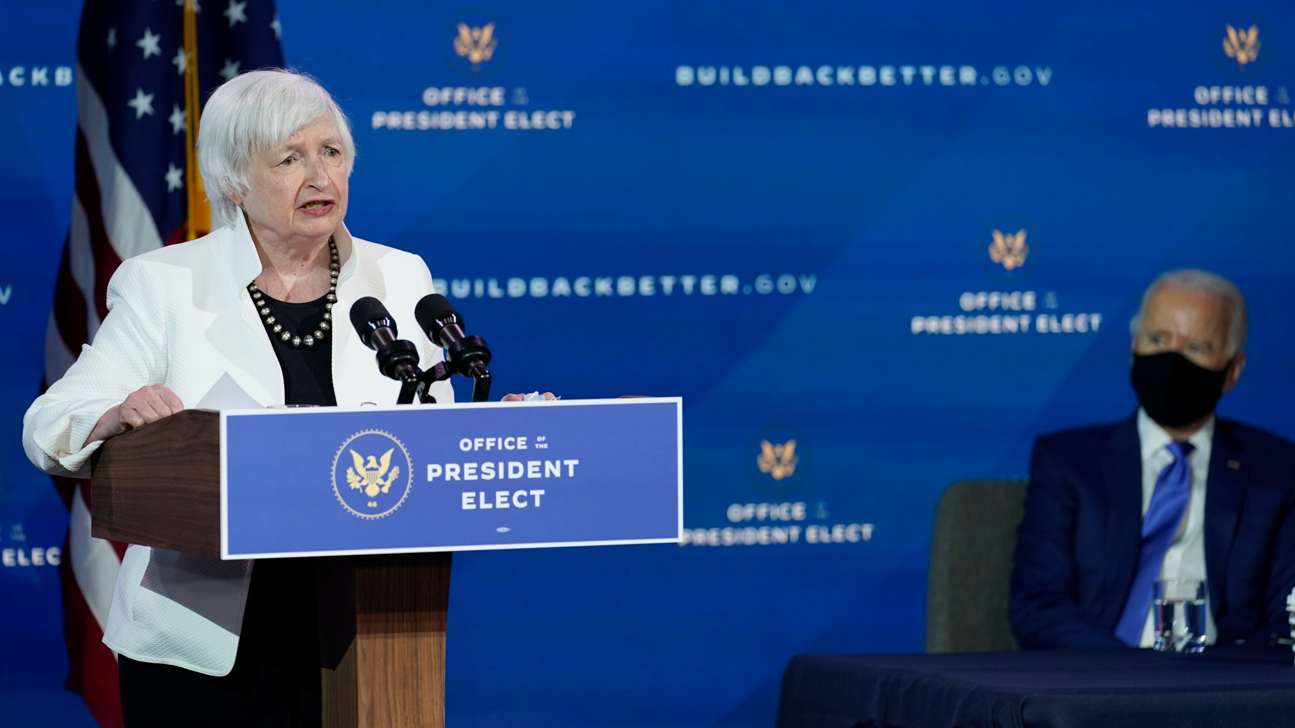 President-elect Joe Biden, right, listens as Janet Yellen, who Biden nominated to serve as Secretary of the Treasury, speaks at The Queen theater, Tuesday, Dec. 1, 2020, in Wilmington, Del. (Andrew Harnik/AP Photo)