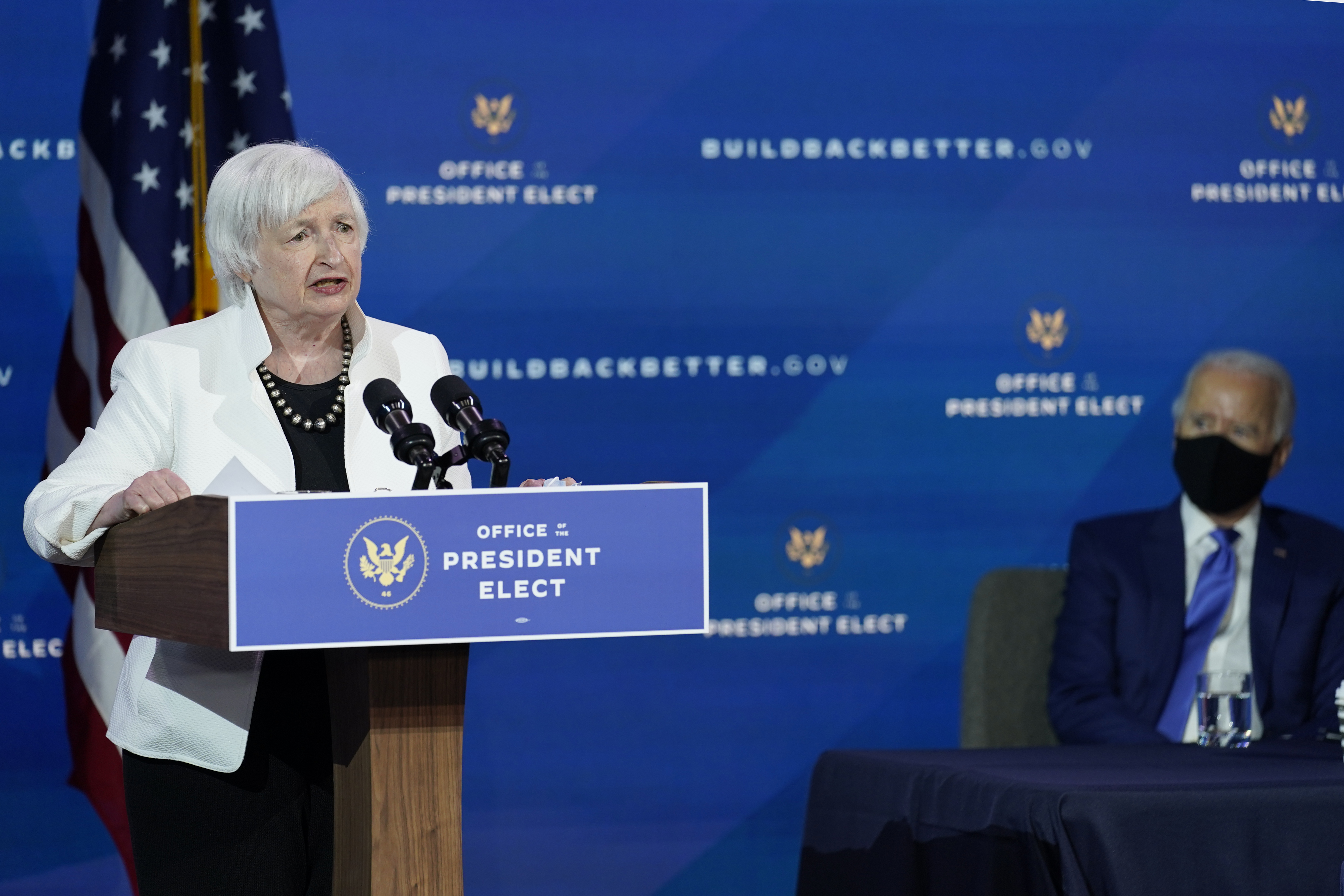 President-elect Joe Biden, right, listens as Janet Yellen, who Biden nominated to serve as Secretary of the Treasury, speaks at The Queen theater, Tuesday, Dec. 1, 2020, in Wilmington, Del. (Andrew Harnik/AP Photo)