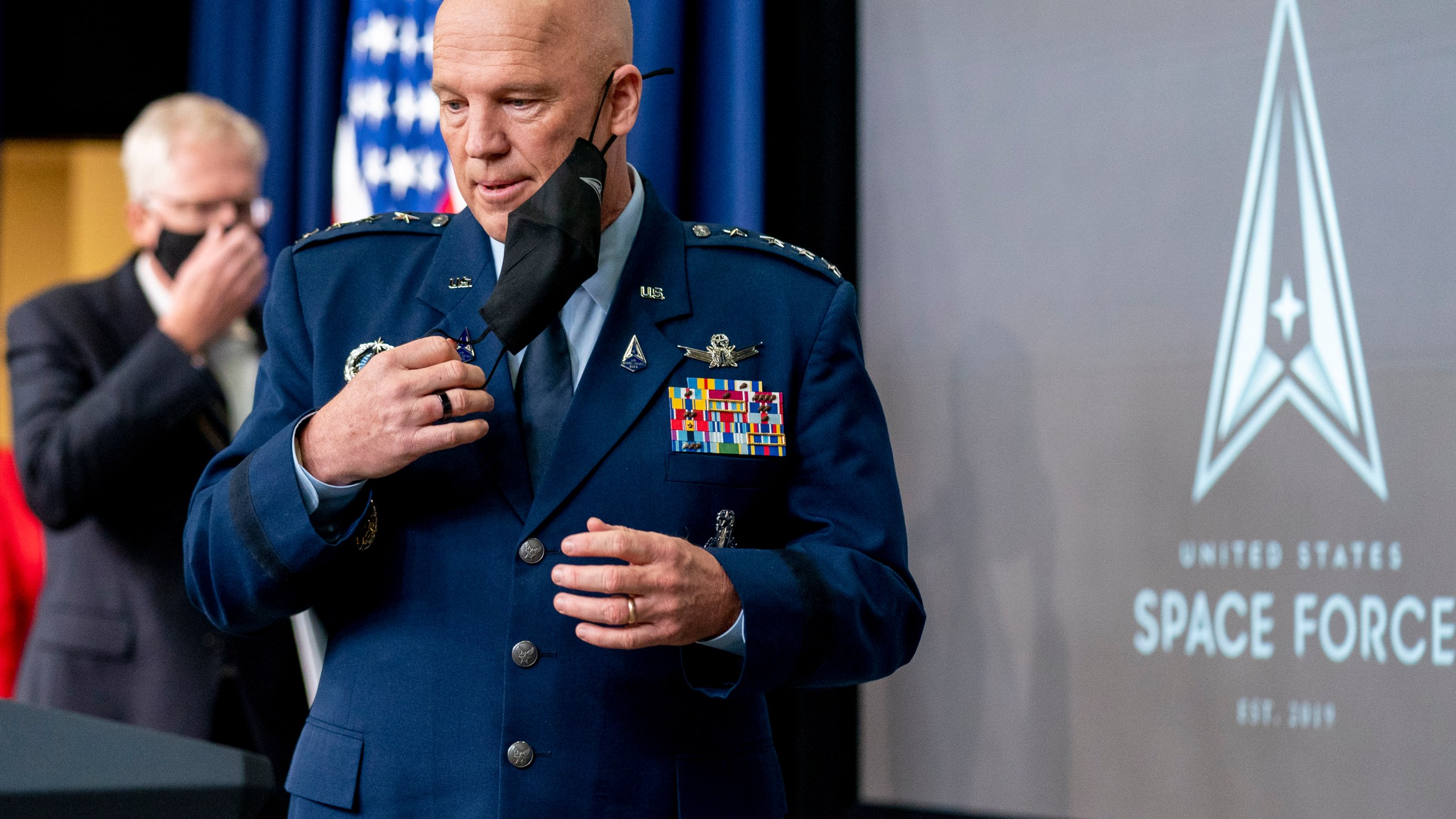 Chief of Space Operations at U.S. Space Force Gen. John Raymond takes the podium to speak at a ceremony to commemorate the first birthday of the U.S. Space Force at the Eisenhower Executive Office Building on the White House complex​, Friday, Dec. 18, 2020, in Washington. (AP Photo/Andrew Harnik)