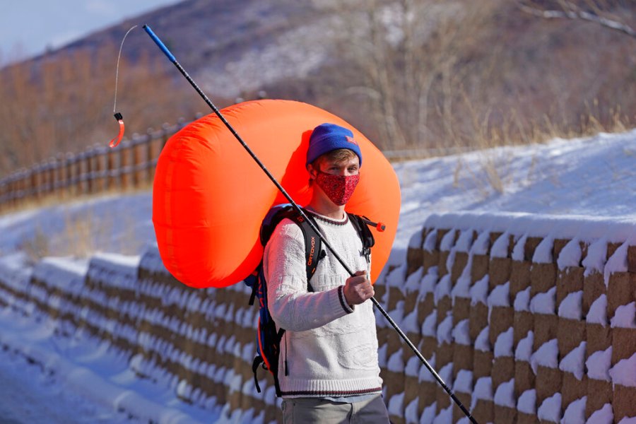 Cameron French, from White Pine Touring, wears an Ascent 40 AVABAG avalanche backpack on Dec. 18, 2020, in Park City, Utah. (AP Photo/Rick Bowmer)