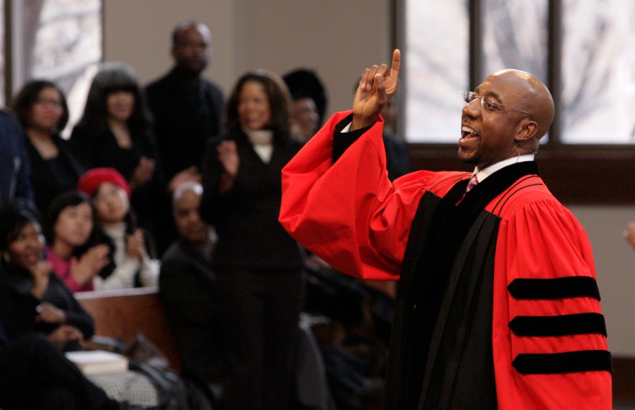 In this Sunday Jan. 18, 2009 file photo, Rev. Raphael Warnock delivers a sermon during a church service at Ebenezer Baptist Church in Atlanta. (AP Photo/John Amis)