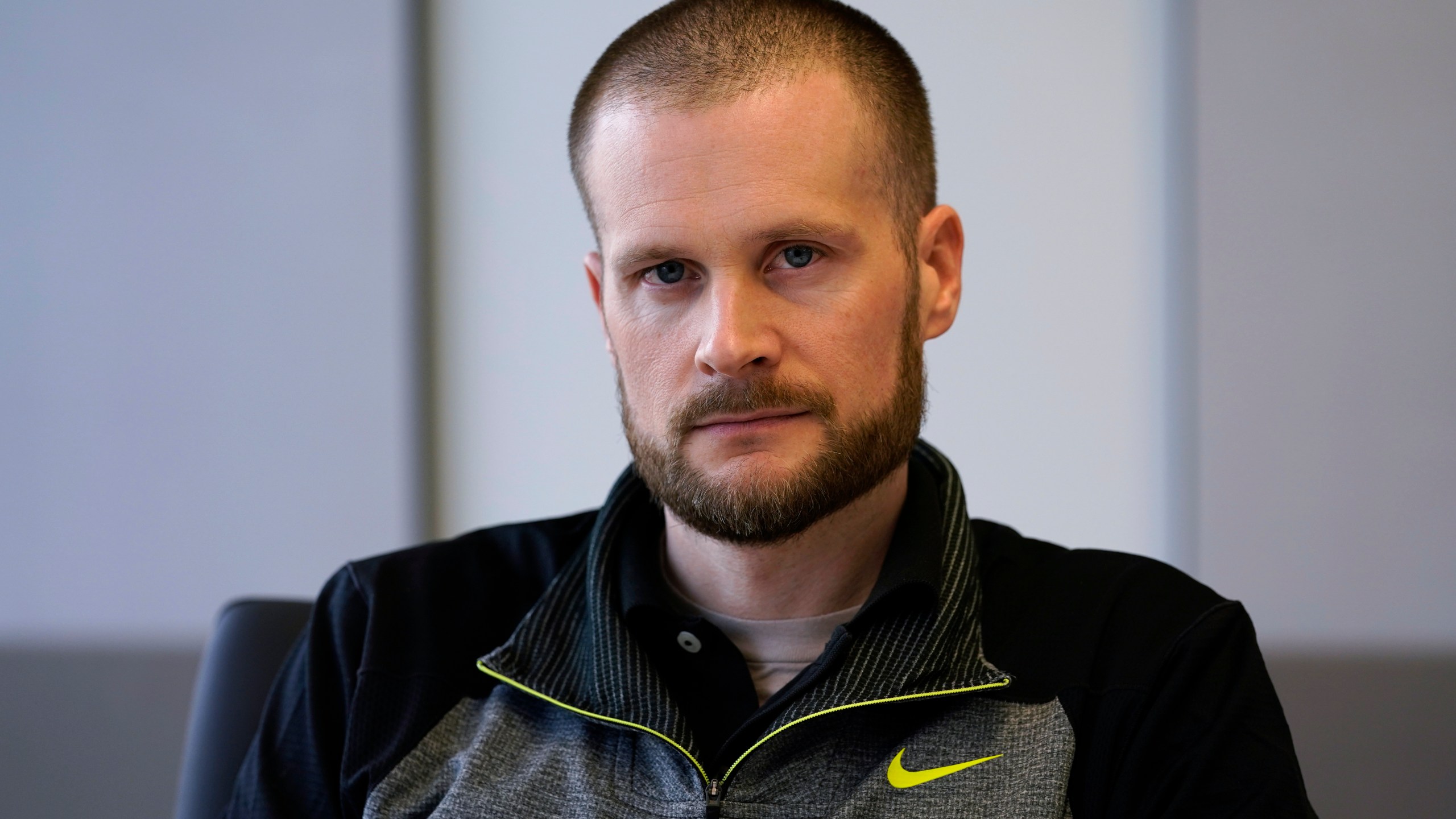 In this Dec. 31, 2020, file photo pardoned Blackwater contractor Evan Liberty poses for a photo in Washington. Liberty is one of four former Blackwater contractors pardoned by President Donald Trump in one of his final acts in office, wiping away their convictions in a 2007 shooting rampage in Baghdad that killed more than a dozen Iraqi civilians. The pardons were met with intense condemnation both in the United States and the Middle East. (AP Photo/Susan Walsh)