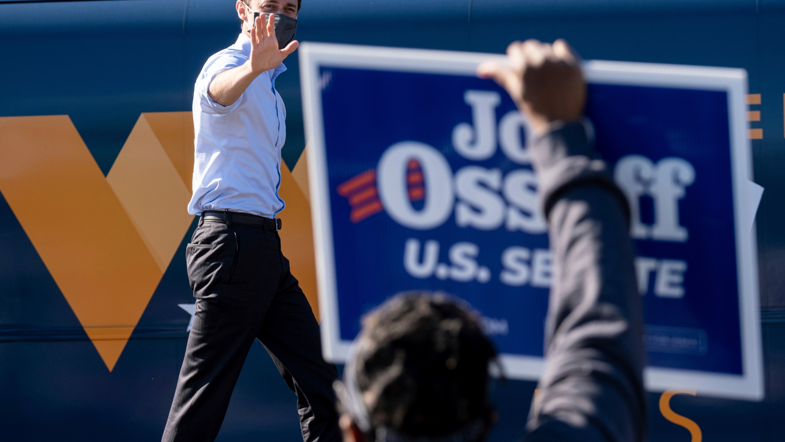 In this Dec. 21, 2020, file photo Democratic U.S. Senate challenger Jon Ossoff during a rally in Columbus, Ga. with Vice President-elect Kamala Harris and fellow Democratic U.S. Senate challenger the Rev. Raphael Warnock. (Ben Gray/AP Photo)