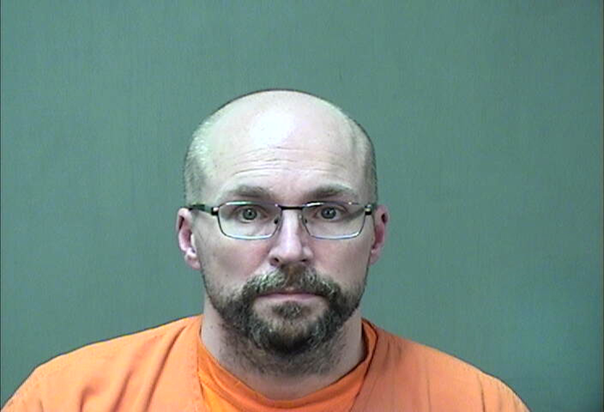 In this booking photo provided by the Ozaukee County Sheriff's Office Monday, Jan. 4, 2021 in Port Washington, Wis. Steven Brandenburg is shown. The Wisconsin pharmacist, accused of intentionally spoiling hundreds of doses of coronavirus vaccine, convinced the world was "crashing down" told police he tried to ruin hundreds of doses of coronavirus vaccine because he felt the shots would mutate people's DNA, according to court documents released Monday. (Ozaukee County Sheriff via AP)