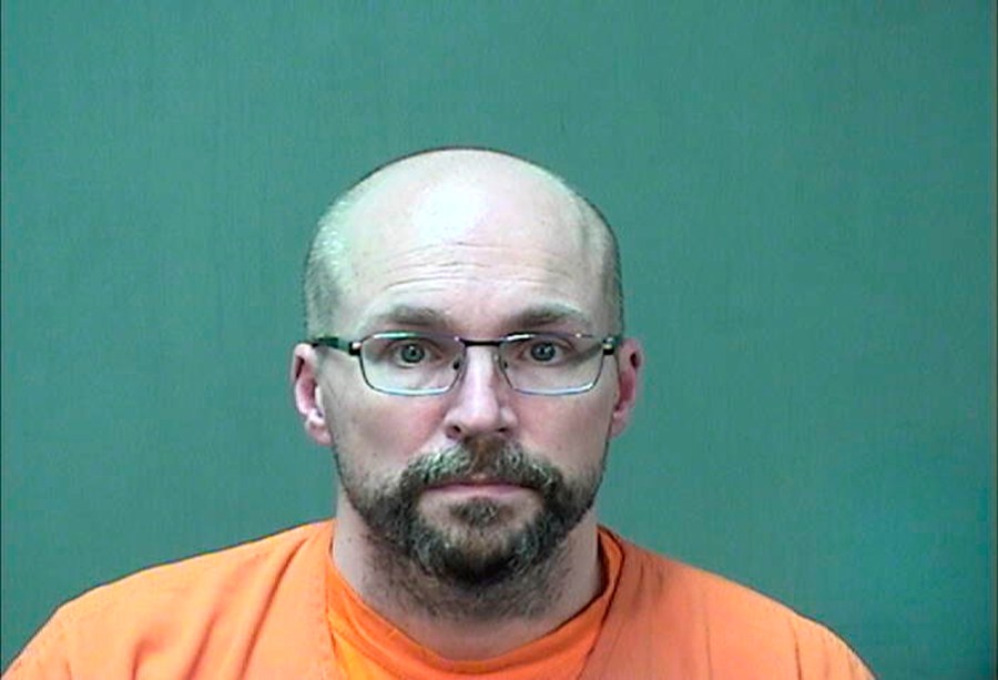 In this booking photo provided by the Ozaukee County Sheriff's Office Monday, Jan. 4, 2021 in Port Washington, Wis. Steven Brandenburg is shown. The Wisconsin pharmacist, accused of intentionally spoiling hundreds of doses of coronavirus vaccine, convinced the world was "crashing down" told police he tried to ruin hundreds of doses of coronavirus vaccine because he felt the shots would mutate people's DNA, according to court documents released Monday. (Ozaukee County Sheriff via AP)