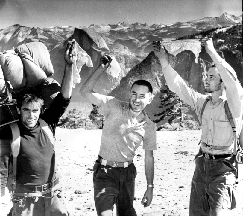 From left, Warren Harding, Wayne Merry and George Whitmore wave their handkerchiefs in elation at scaling the unclimbed face of El Capitan in Yosemite National Park in 1958. The picture was taken by Fresno Bee staff photographer Loyal Savaria within a few minutes after they walked up to the summit.(Loyal Savaria/Fresno Bee Archive via AP)