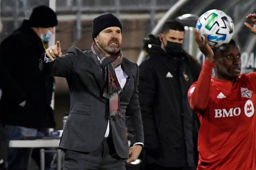 In this Nov. 24, 2020, file photo, then-Toronto FC head coach Greg Vanney, left, calls out to his team during the first half of an MLS soccer playoff match against Nashville SC in East Hartford, Conn. (Jessica Hill/Associated Press)