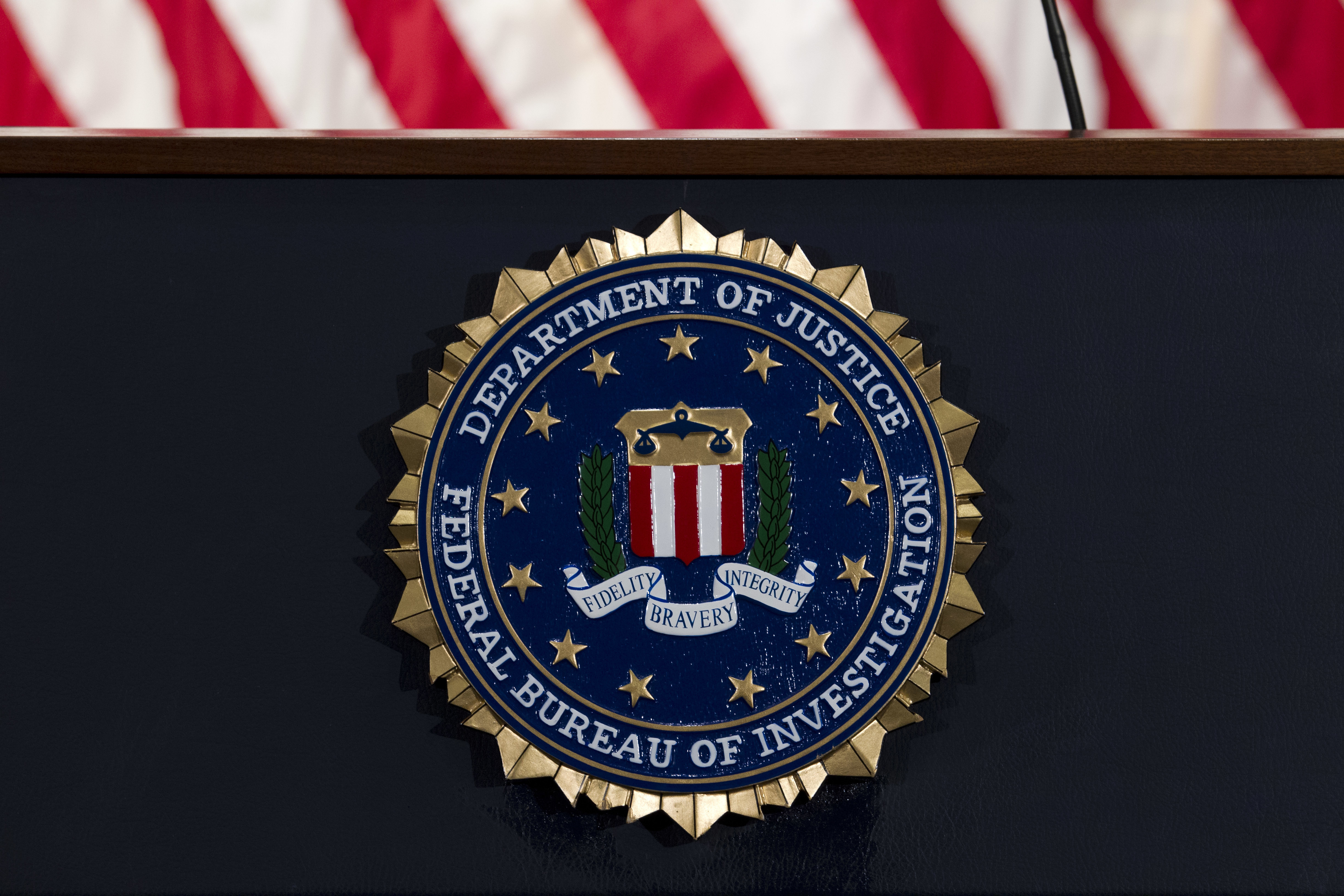 In this June 14, 2018, file photo, the FBI seal is seen before a news conference at FBI headquarters in Washington. (Jose Luis Magana/Associated Press)