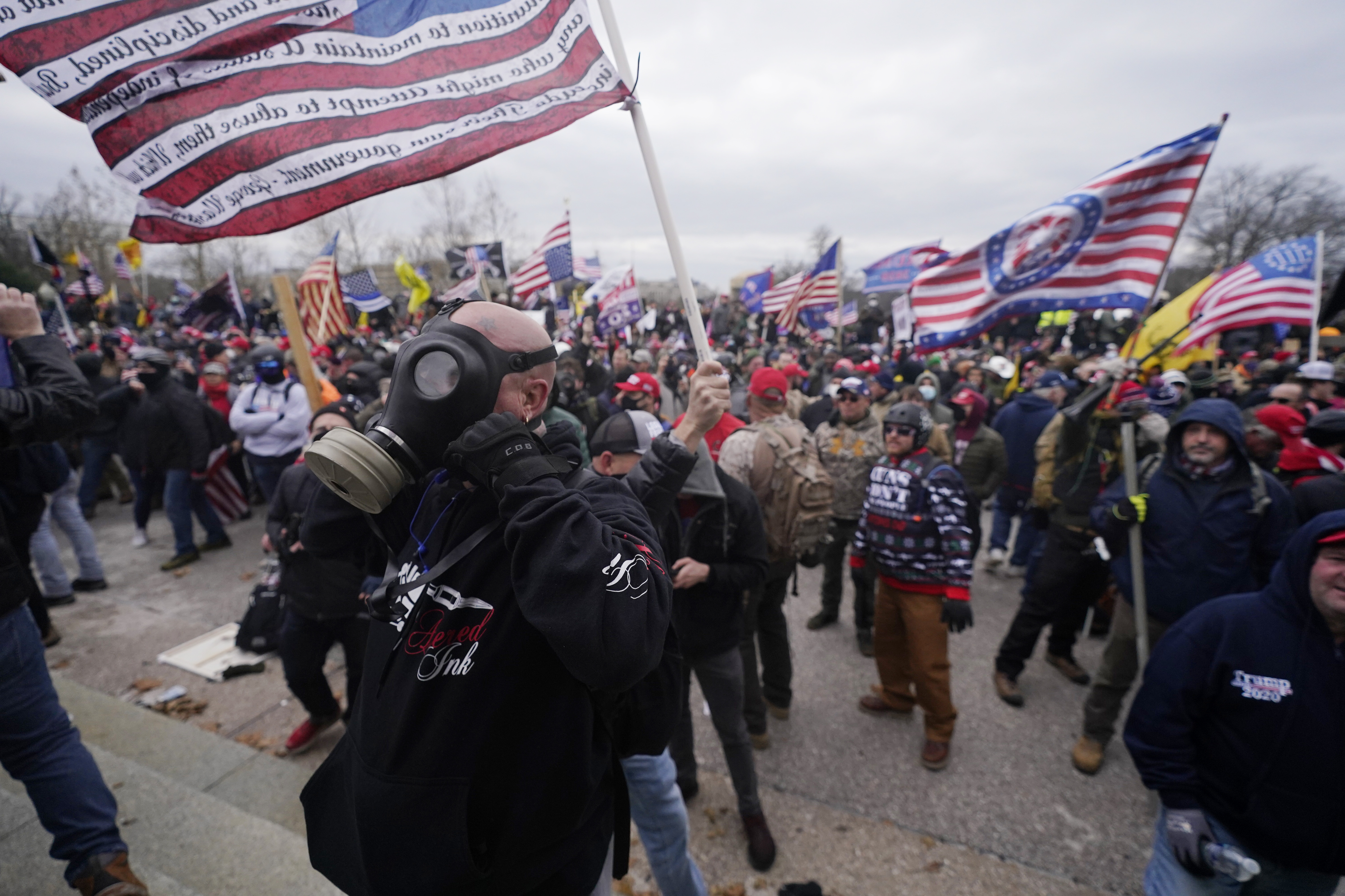 Trump supporters gather outside the Capitol, Wednesday, Jan. 6, 2021, in Washington. (Julio Cortez/AP Photo)