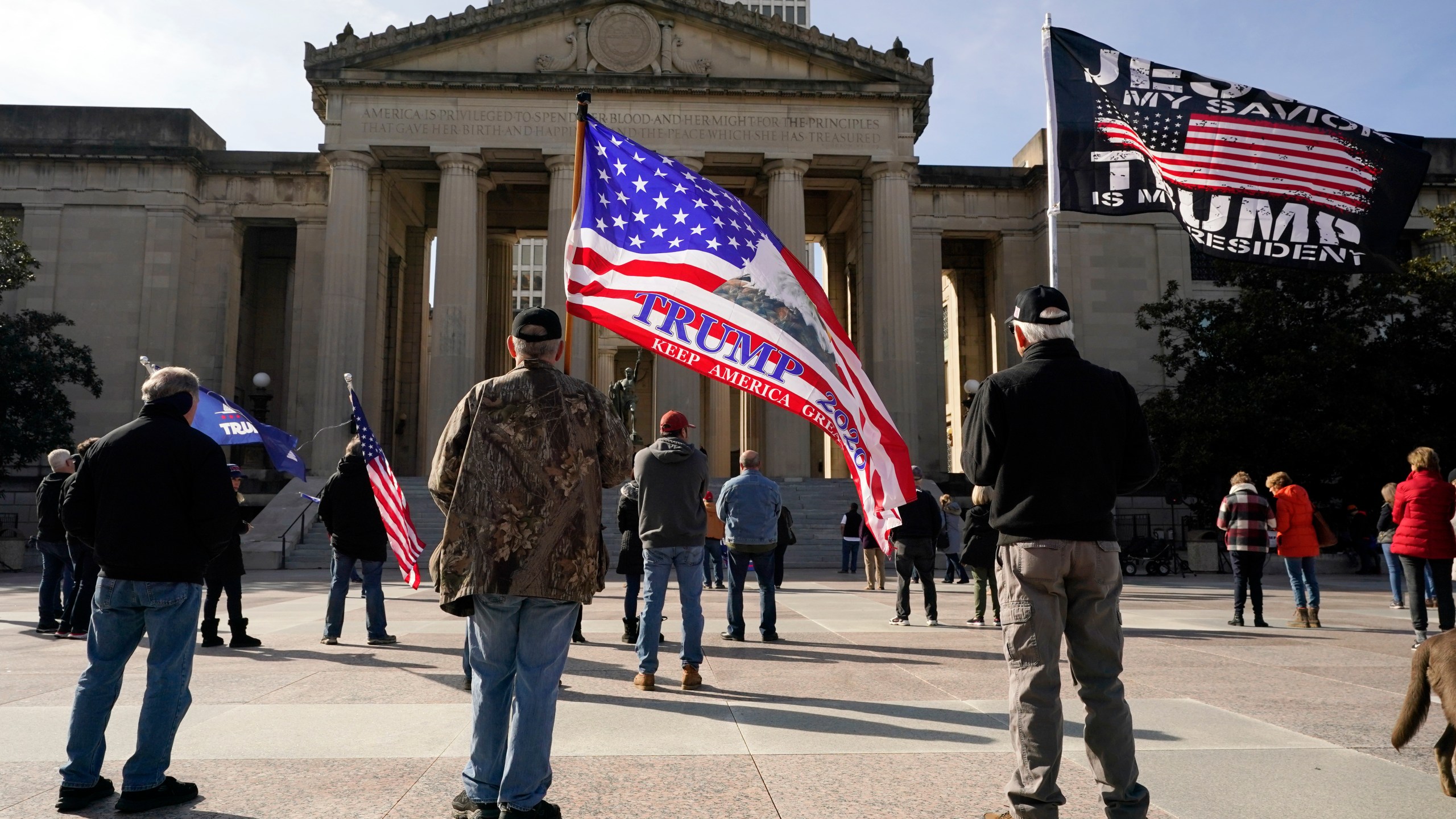 People take part in a rally at the Legislative Plaza, Wednesday, Jan. 6, 2021, in Nashville, Tenn. (AP Photo/Mark Humphrey)