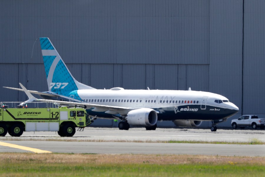 In this June 29, 2020, file photo, A Boeing 737 MAX jet taxis after landing at Boeing Field following a test flight in Seattle. (Elaine Thompson/Associated Press)