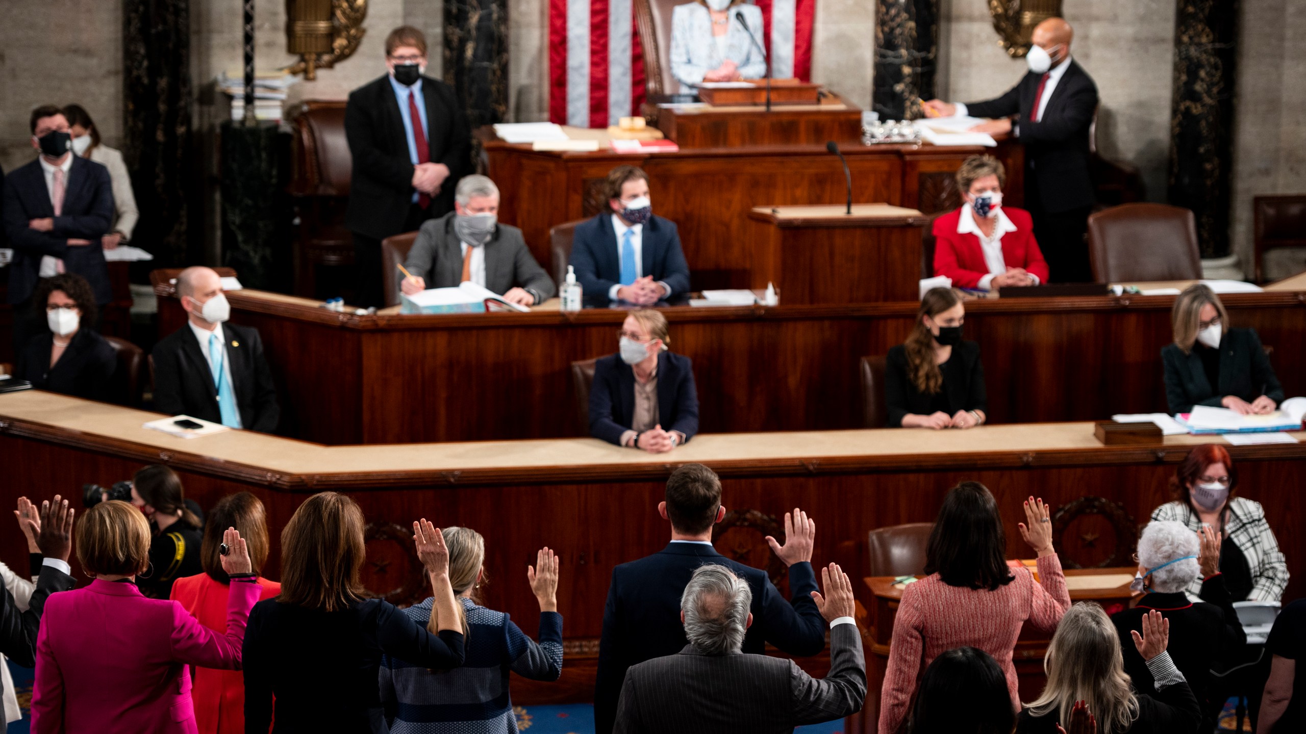 In this Jan. 3, 2021, file photo, House Speaker Nancy Pelosi administers the oath of office to members of the 117th Congress at the U.S. Capitol in Washington. (Bill Clark/Pool Photo via AP, File)