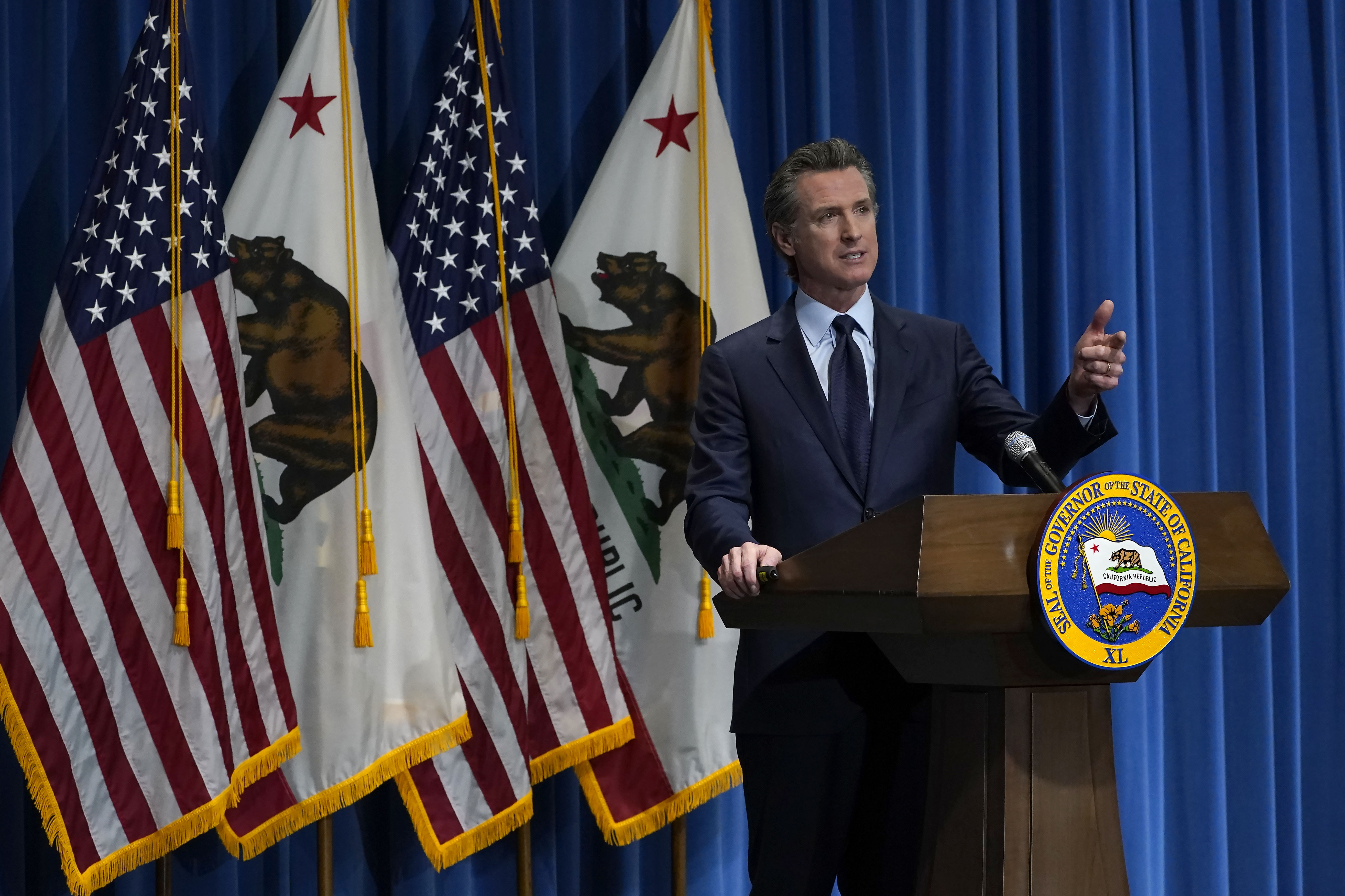 California Gov. Gavin Newsom outlines his 2021-2022 state budget proposal during a news conference in Sacramento on Jan. 8, 2021. (Rich Pedroncelli / Associated Press)