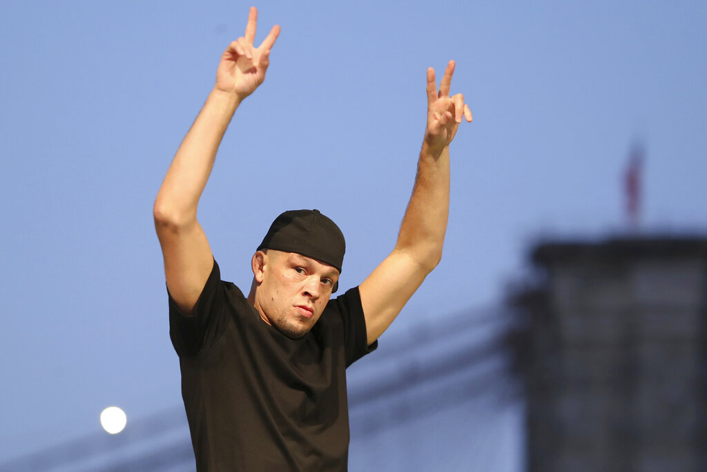 Nate Diaz is seen at a news conference for the UFC 244 mixed martial arts event in New York, in this Thursday, Sept. 19, 2019, file photo. Diaz is among many fighters who already used marijuana actively when not in competition. (AP Photo/Gregory Payan)