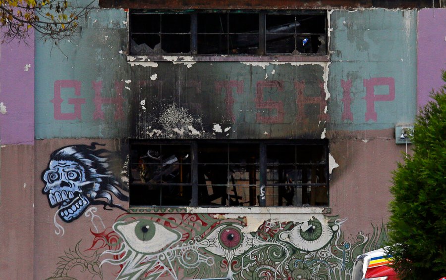 In this Dec. 7, 2016, file photo is the front of The Ghost Ship warehouse damaged from a deadly fire in Oakland, Calif. (AP Photo/Eric Risberg, File)