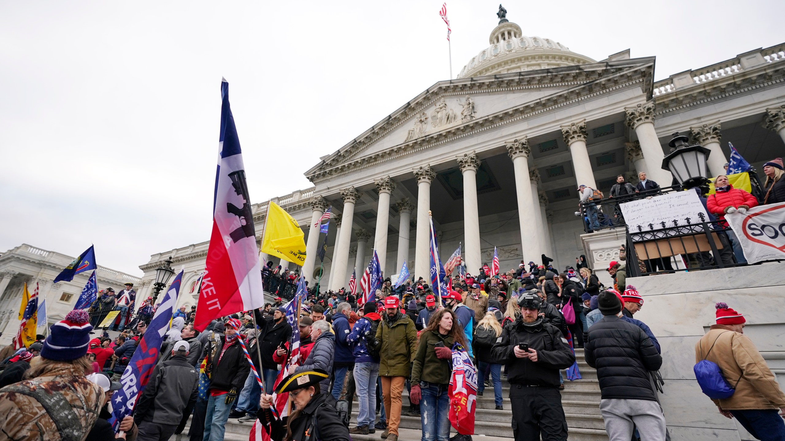 Donald Trump supporters gather outside the Capitol in Washington on Jan. 6, 2021. (Manuel Balce Ceneta / Associated Press)