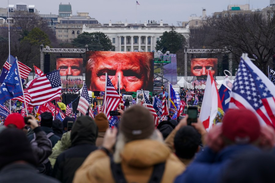 In this Jan. 6, 2021 file photo, Trump supporters participate in a rally in Washington. (AP Photo/John Minchillo)