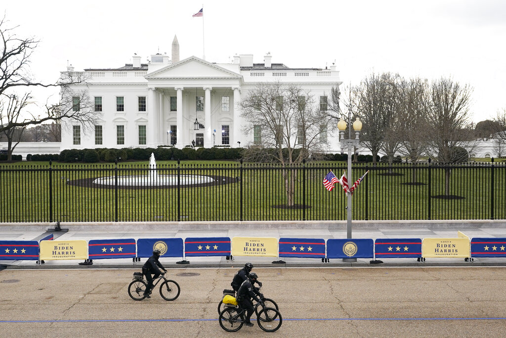 Police work in front of the White House ahead of Inauguration Day ceremonies, Wednesday, Jan. 20, 2021, in Washington. (AP Photo/David J. Phillip)