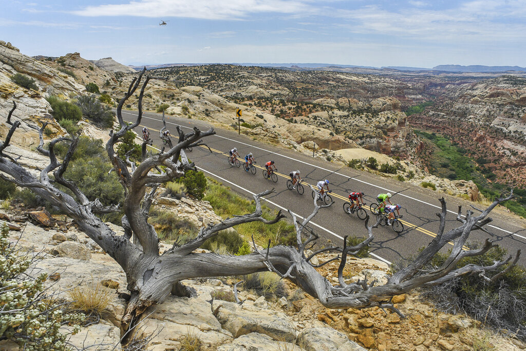 In this Aug. 2, 2016, file photo, cyclists race along the scenic Byway 12 above the Grand Staircase-Escalante National Monument during the Tour Of Utah bike race. (Francisco Kjolseth/The Salt Lake Tribune via AP, File)