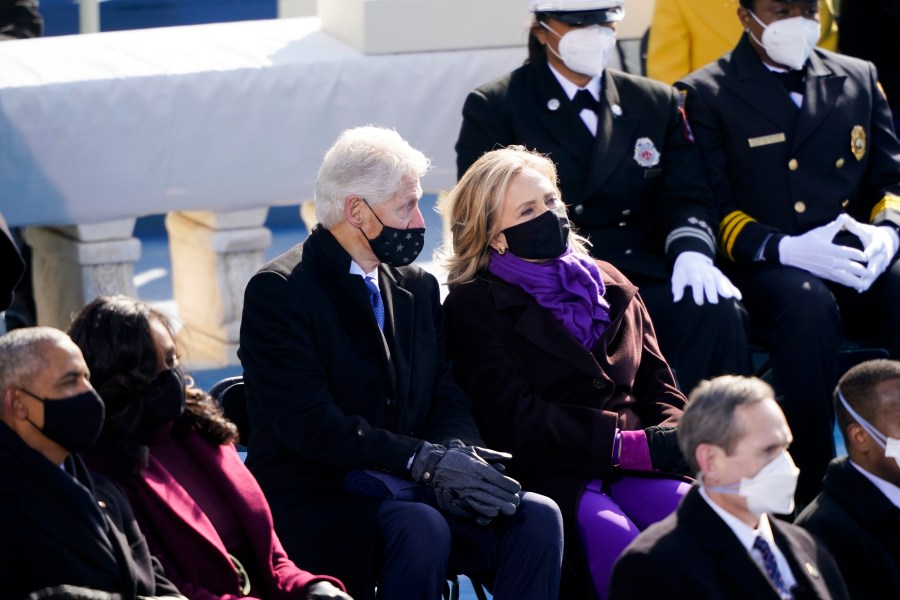 Former President Barack Obama and his wife Michelle and former President Bill Clinton and former Secretary of State Hillary Clinton attend the 59th Presidential Inauguration at the U.S. Capitol in Washington, Wednesday, Jan. 20, 2021. (AP Photo/Carolyn Kaster)