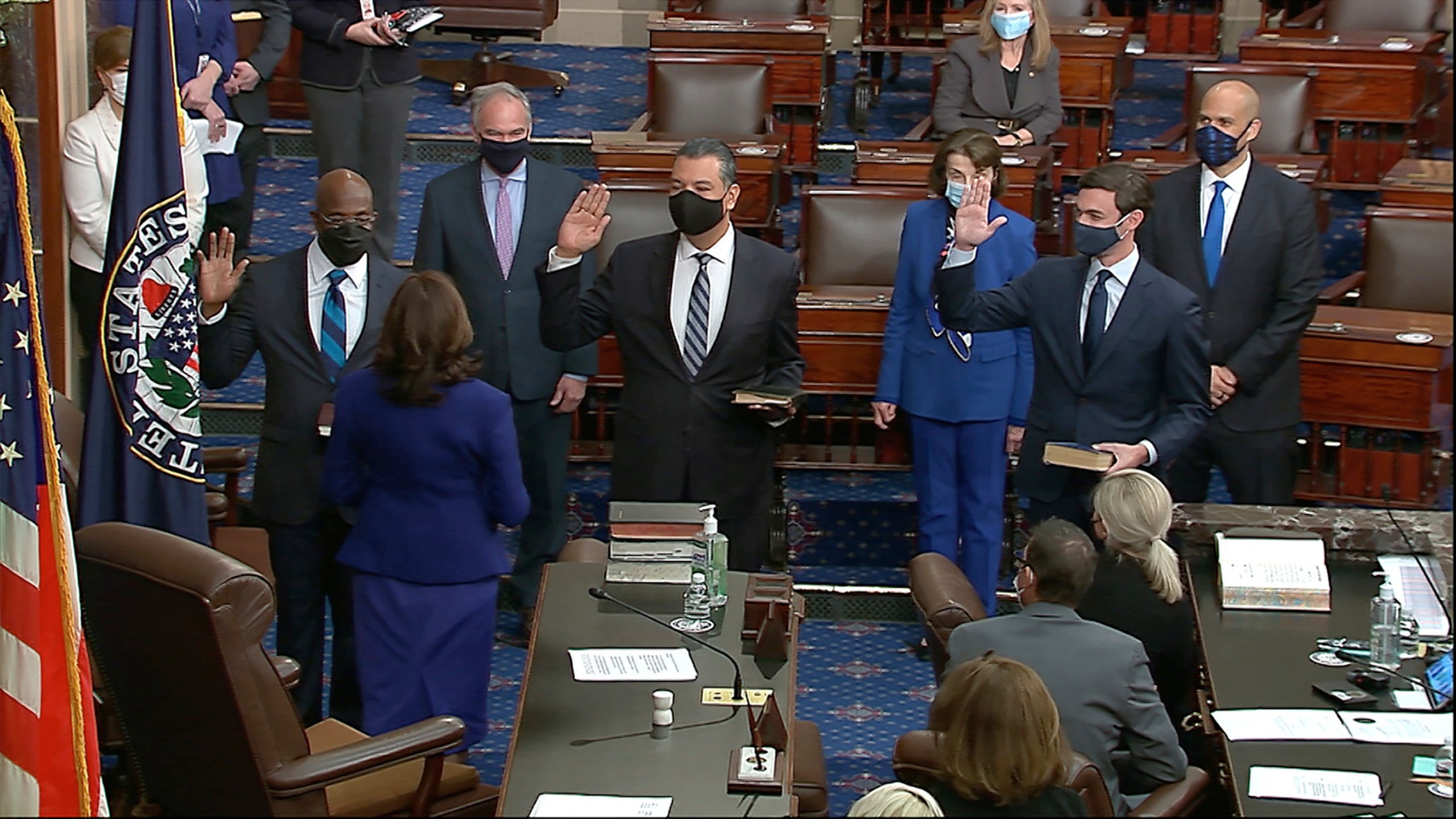 In this image from video, Vice President Kamala Harris swears in Sen. Raphael Warnock, D-Ga., Sen. Alex Padilla, D-Calif., and Sen. Jon Ossoff, D-Ga., on the floor of the Senate on Jan. 20, 2021, on Capitol Hill in Washington. (Senate Television via Associated Press)