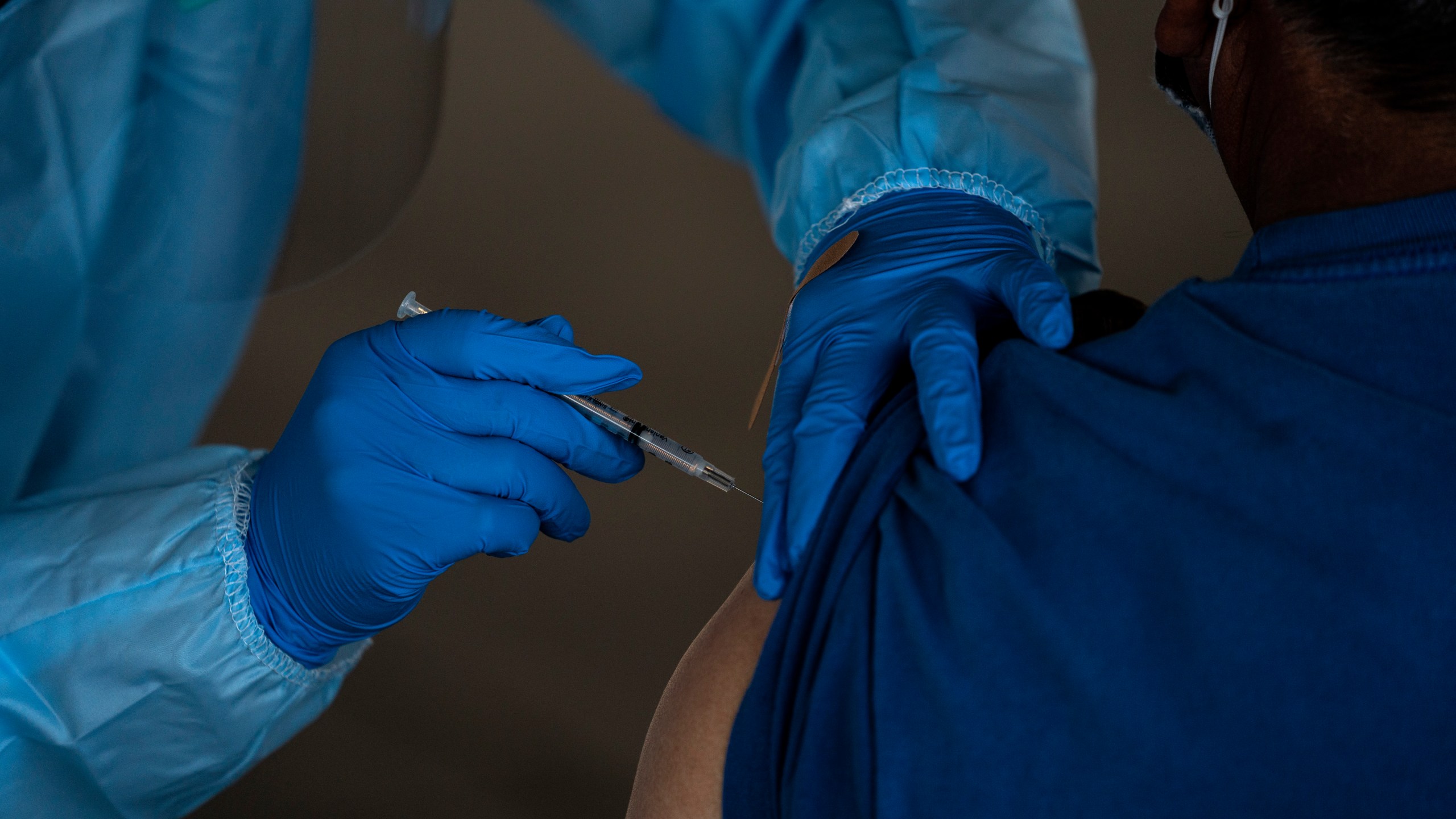 A Hispanic farm worker receives the Pfizer-BioNTech COVID-19 vaccine in Mecca, Calif., Thursday, Jan. 21, 2021. (AP Photo/Jae C. Hong)A Hispanic farm worker receives the Pfizer-BioNTech COVID-19 vaccine in Mecca, Calif., Thursday, Jan. 21, 2021. (AP Photo/Jae C. Hong)